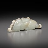 A JADE 'RABBIT' PENDANT, LATE SHANG TO EARLY WESTERN ZHOU DYNASTY