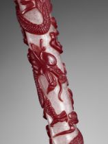A CARVED RED OVERLAY SNOWFLAKE GLASS 'DRAGON' BRUSH HANDLE, QING DYNASTY
