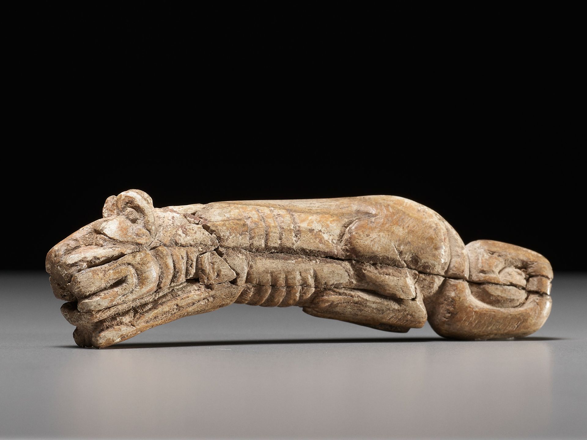 A RARE CARVED BONE FIGURE OF A TIGER, SHANG DYNASTY - Image 2 of 17