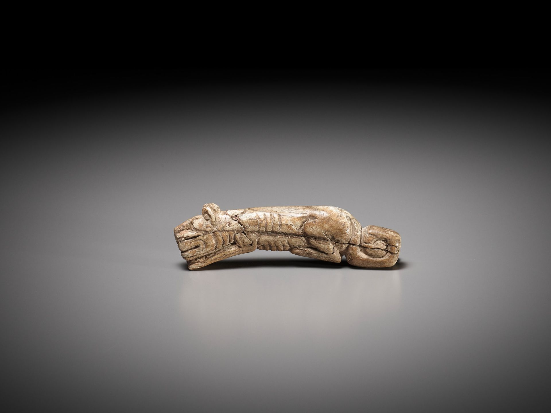A RARE CARVED BONE FIGURE OF A TIGER, SHANG DYNASTY - Image 10 of 17