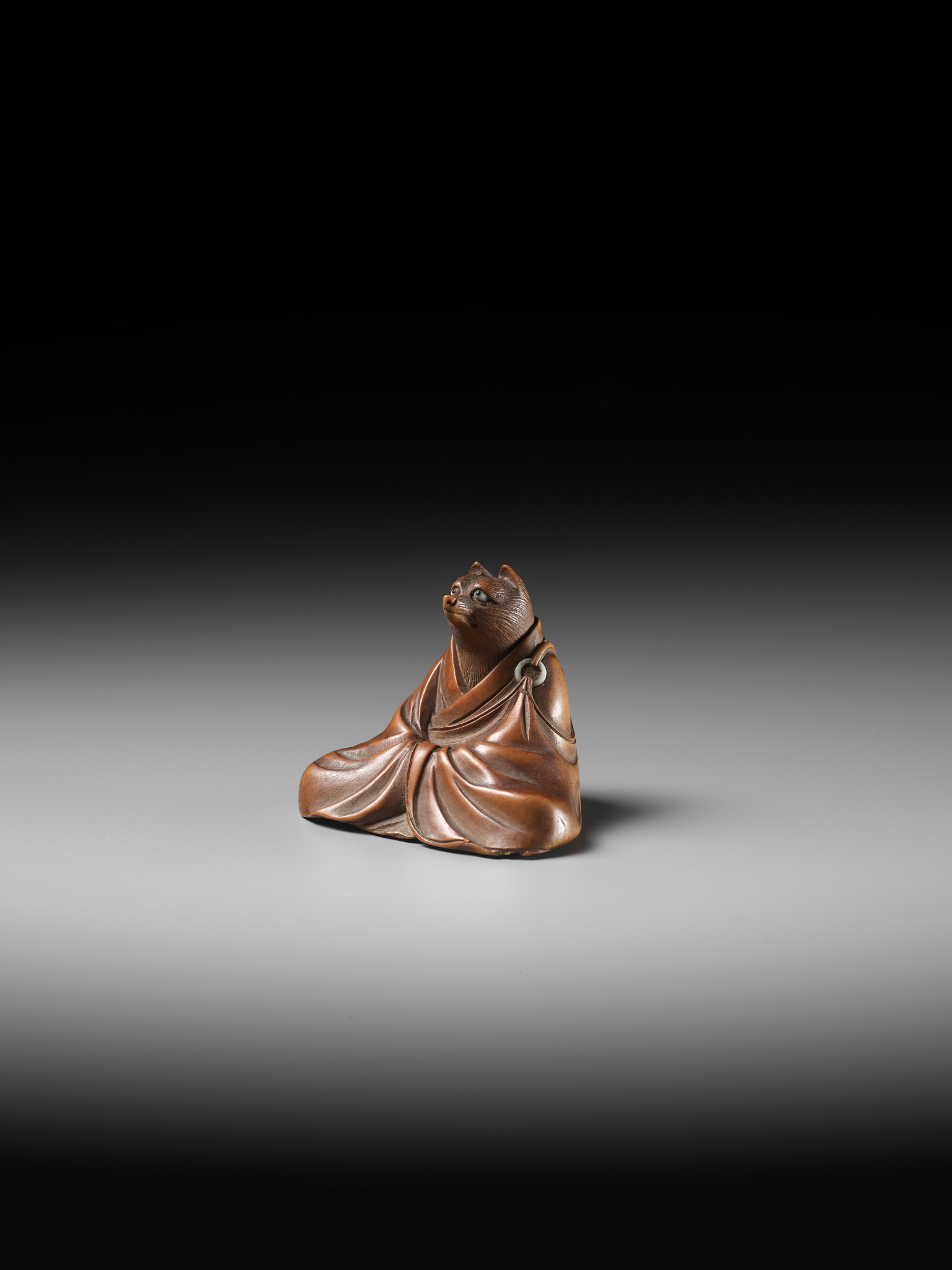 ANRAKU: A FINE AND HUMOROUS WOOD NETSUKE OF TANUKI DISGUISED AS A PRIEST - Image 8 of 14