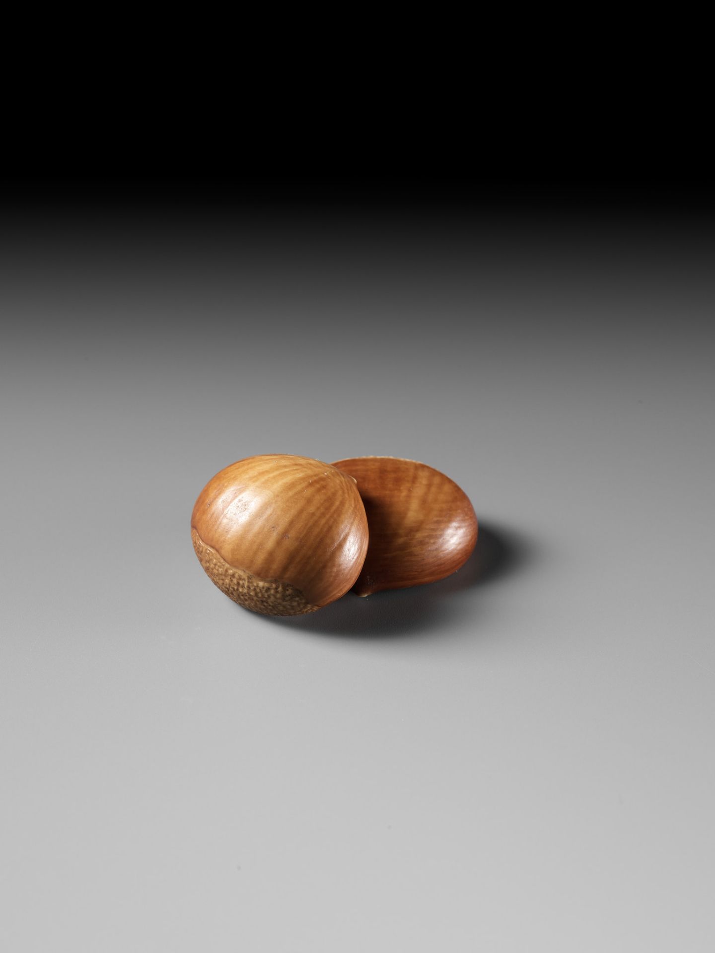 ANDO RYOKUZAN: A FINE LACQUERED IVORY NETSUKE OF TWO CHESTNUTS - Image 7 of 11