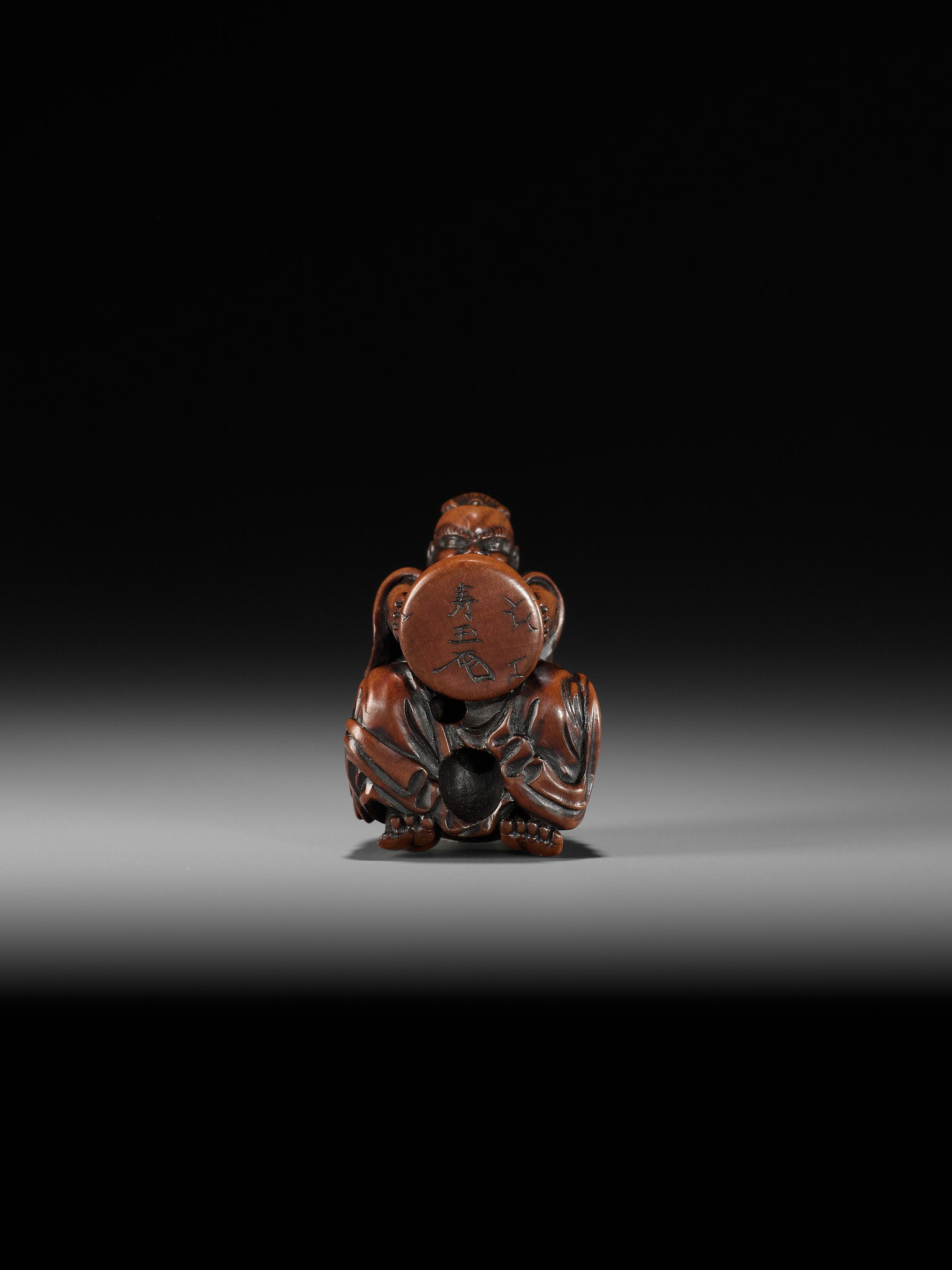 JUGYOKU: A POWERFUL WOOD NETSUKE OF A NIO CRUSHING MOCHI - Image 9 of 10