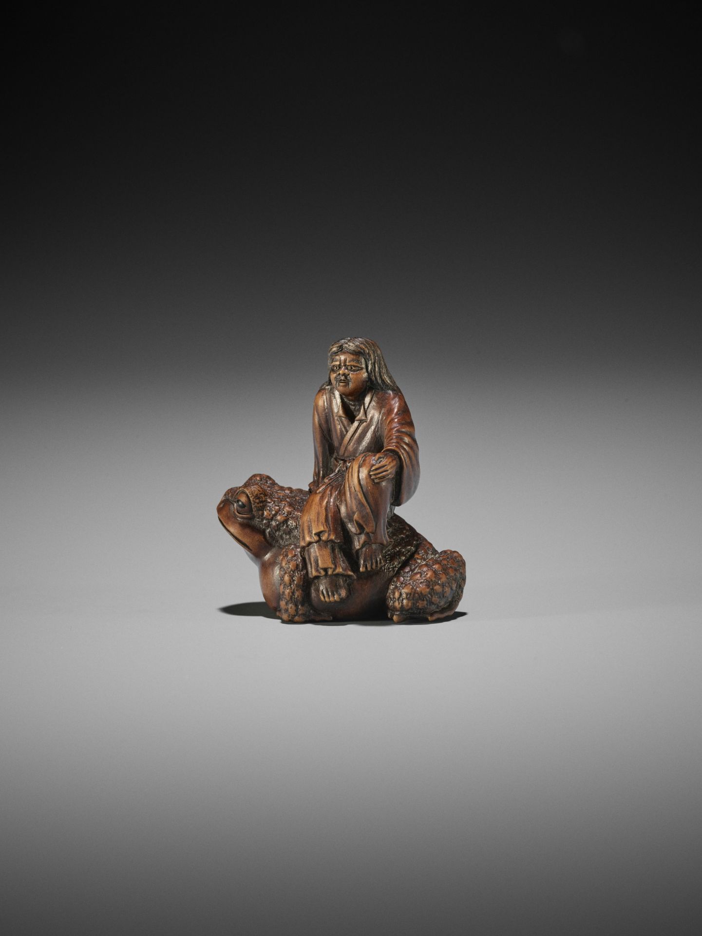 MASANAO: A RARE WOOD NETSUKE OF GAMA SENNIN SEATED ON THE FROG GOD SEIAJIN - Image 10 of 15