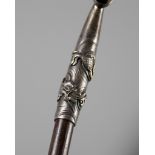 A FINE AND LARGE SILVER AND BAMBOO KISERU (PIPE) DEPICTING TWIN DRAGONS