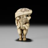 A HUMOROUS OSAKA SCHOOL IVORY NETSUKE OF TANUKI DISGUISED AS A SAKE VENDOR