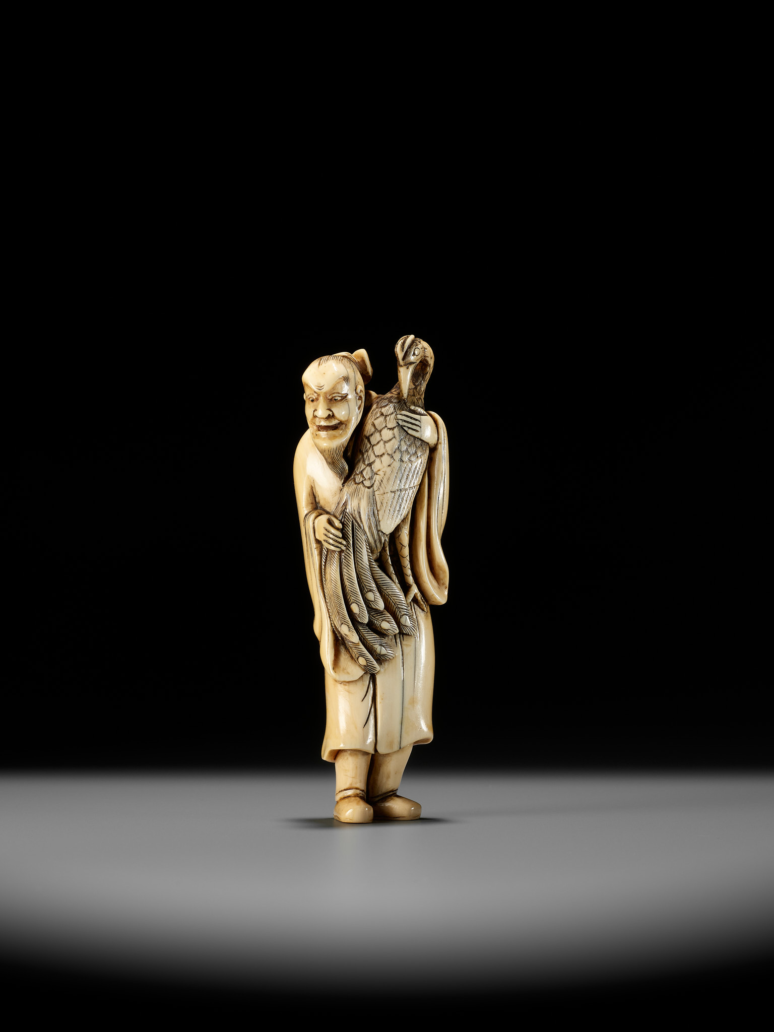 A VERY RARE AND LARGE IVORY NETSUKE OF BAIFUKU WITH HO-O BIRD - Image 7 of 16