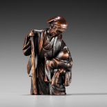 HOSHUNSAI MASAYUKI: A FINE WOOD NETSUKE DEPICTING THE LEGEND OF THE TONGUE CUT SPARROW