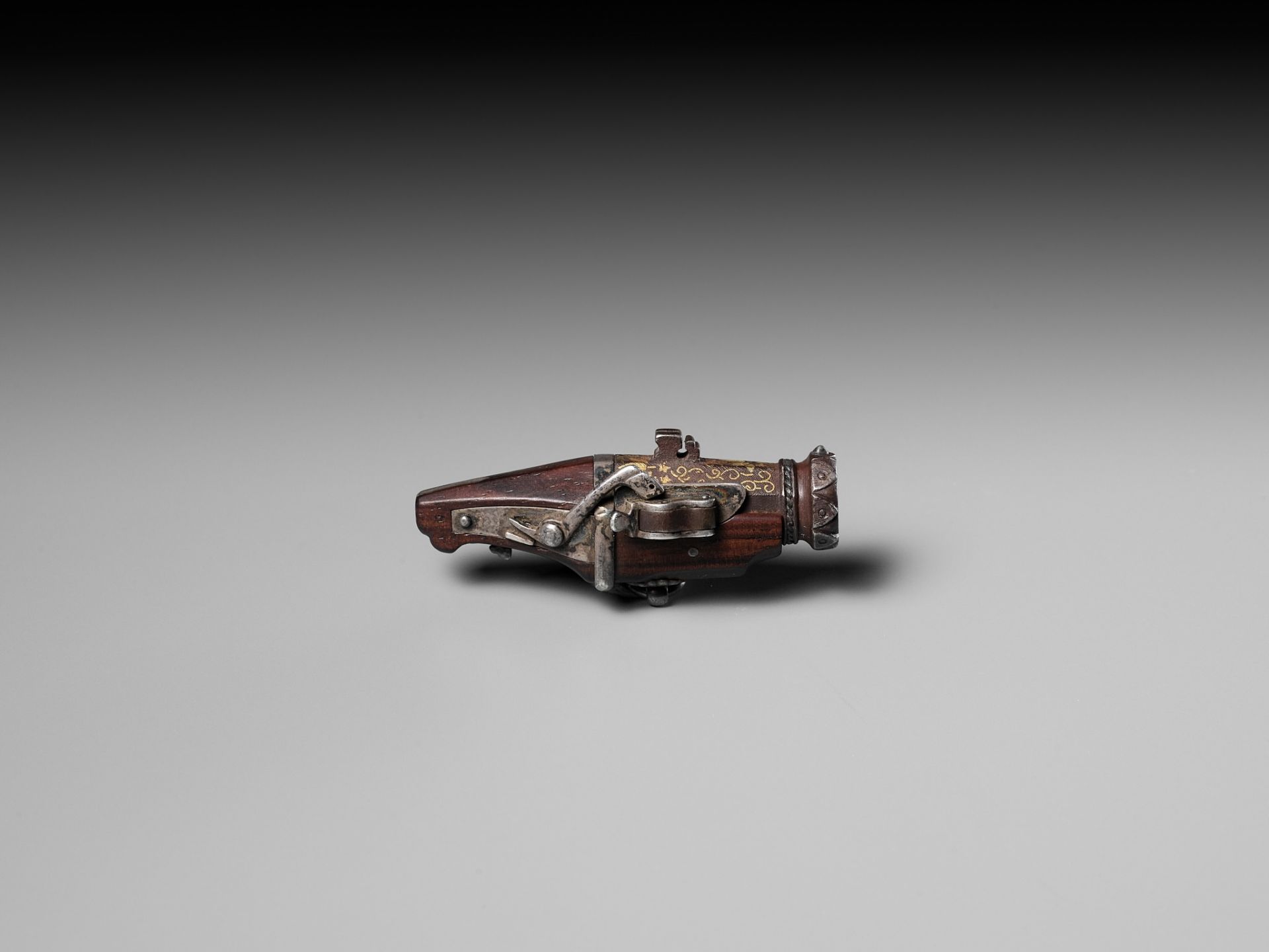 A RARE WOOD AND IRON NETSUKE OF A MINIATURE TANEGASHIMA TEPPO (RIFLE) - Image 3 of 9