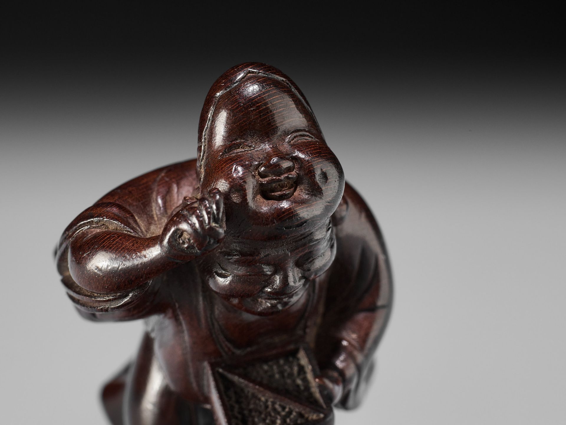 A FINE WOOD NETSUKE OF HOTEI AT SETSUBUN - Image 2 of 12