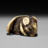 A FINE KYOTO SCHOOL ANTLER NETSUKE OF A RAT EATING A PEPPER