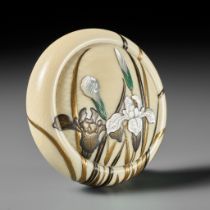 A FINE AND LARGE INLAID IVORY MANJU NETSUKE DEPICTING IRISES (SHOBU)