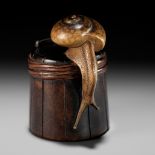 SHIGEMASA: A SUPERB WOOD NETSUKE OF A SNAIL ON BUCKET