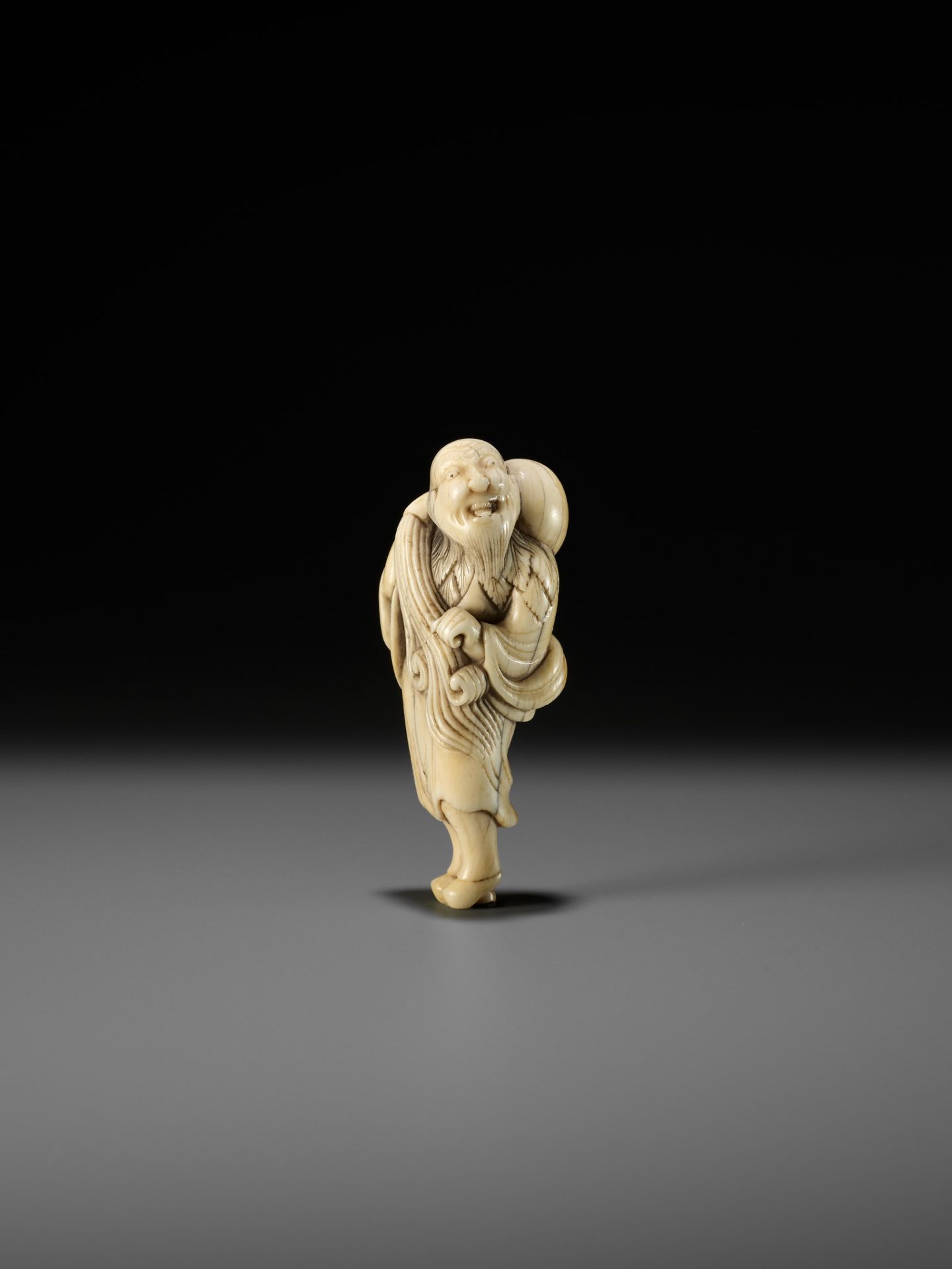 AN IVORY NETSUKE OF CHOKARO SENNIN - Image 8 of 10