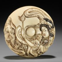 KIKUGAWA RYUKOKU: AN INLAID IVORY MANJU NETSUKE OF A TENNIN