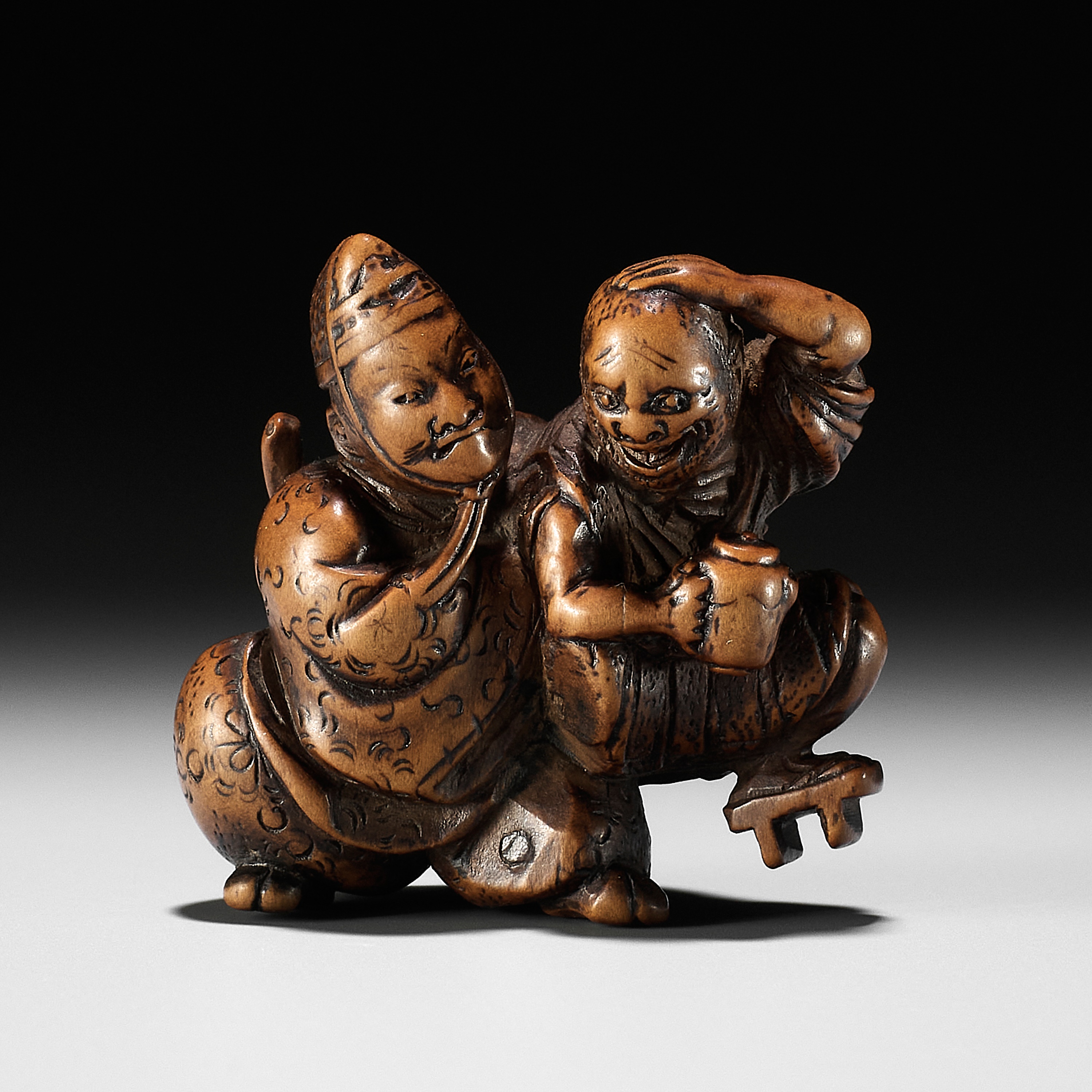 KASHUN: A WOOD NETSUKE OF TAIRA NO TADAMORI CAPTURING THE OIL THIEF