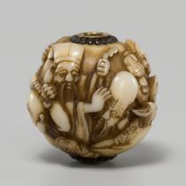 KOMIN: A FINE IVORY OJIME DEPICTING THE SHICHIFUKUJIN (SEVEN GODS OF FORTUNE)