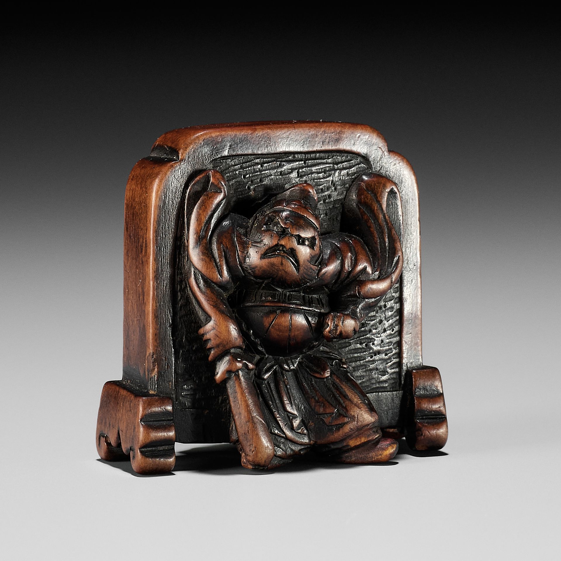 HIDEMASA: A HUMOROUS WOOD NETSUKE OF SHOKI AND ONI