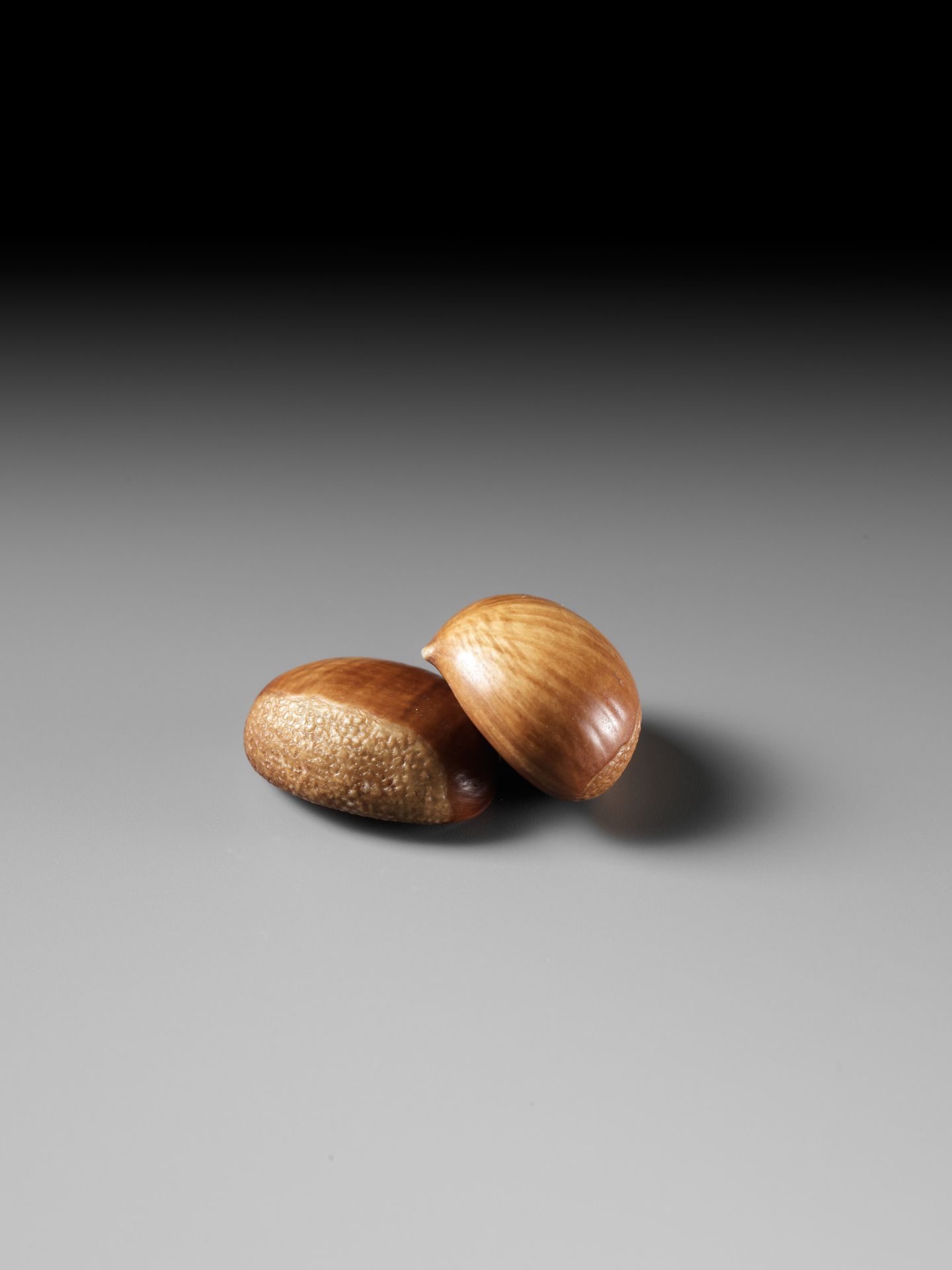 ANDO RYOKUZAN: A FINE LACQUERED IVORY NETSUKE OF TWO CHESTNUTS - Image 2 of 11