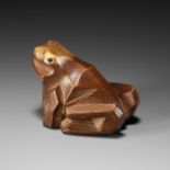 SUKESADA: A RARE ITTOBORI YEW WOOD NETSUKE OF A CROUCHING FROG