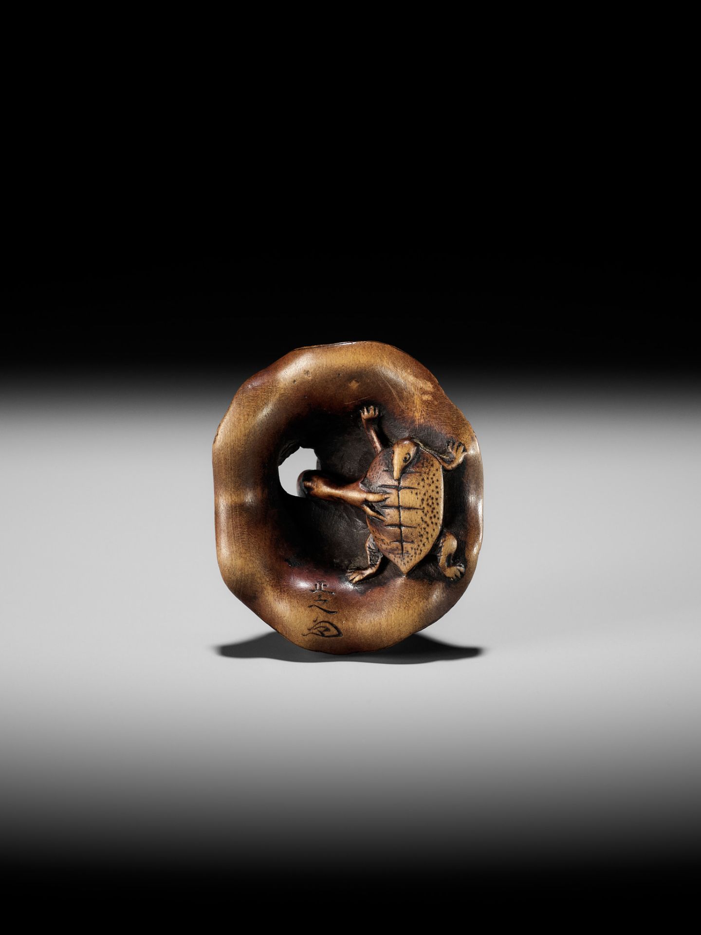 HOSHUNSAI MASAYUKI: A FINE WOOD NETSUKE OF AN ONI CATCHING A TERRAPIN - Image 12 of 13