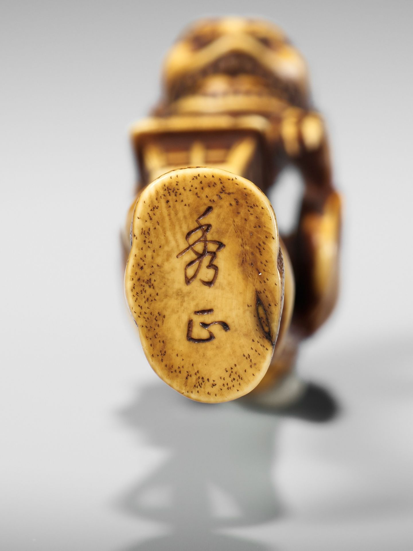 HIDEMASA: A SUPERB AND LARGE IVORY NETSUKE OF THE BAKEMONO MIKOSHI NYUDO - Image 24 of 26