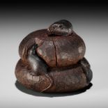 TADASHIGE: A FINE WOOD NETSUKE OF THREE RATS NIBBLING ON KAGAMI MOCHI