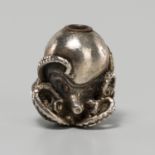 A FINE SILVER OJIME IN THE FORM OF AN OCTOPUS