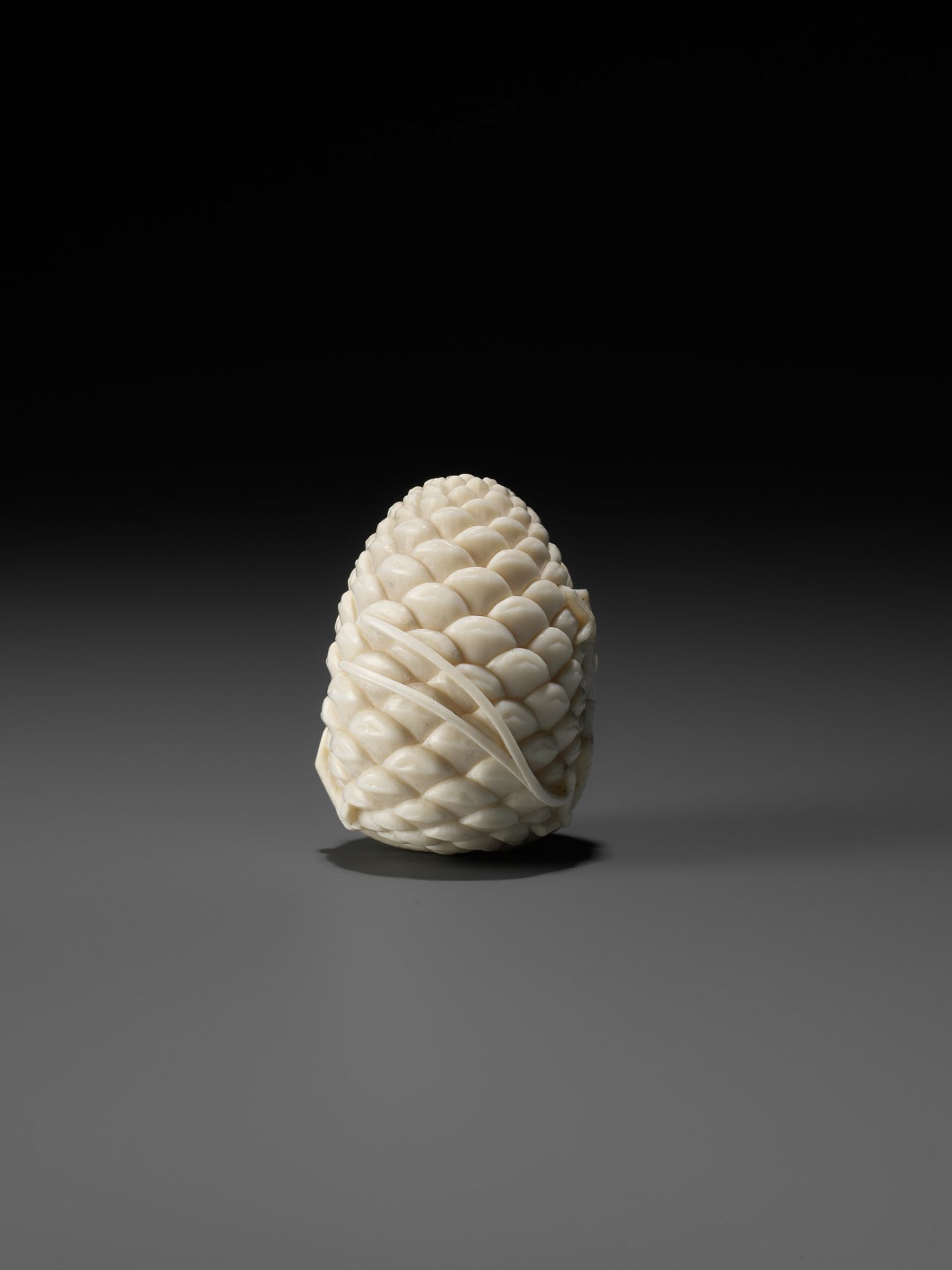 KAIGYOKU MASATSUGU: A FINE IVORY NETSUKE OF JO AND UBA INSIDE A PINECONE - Image 2 of 10