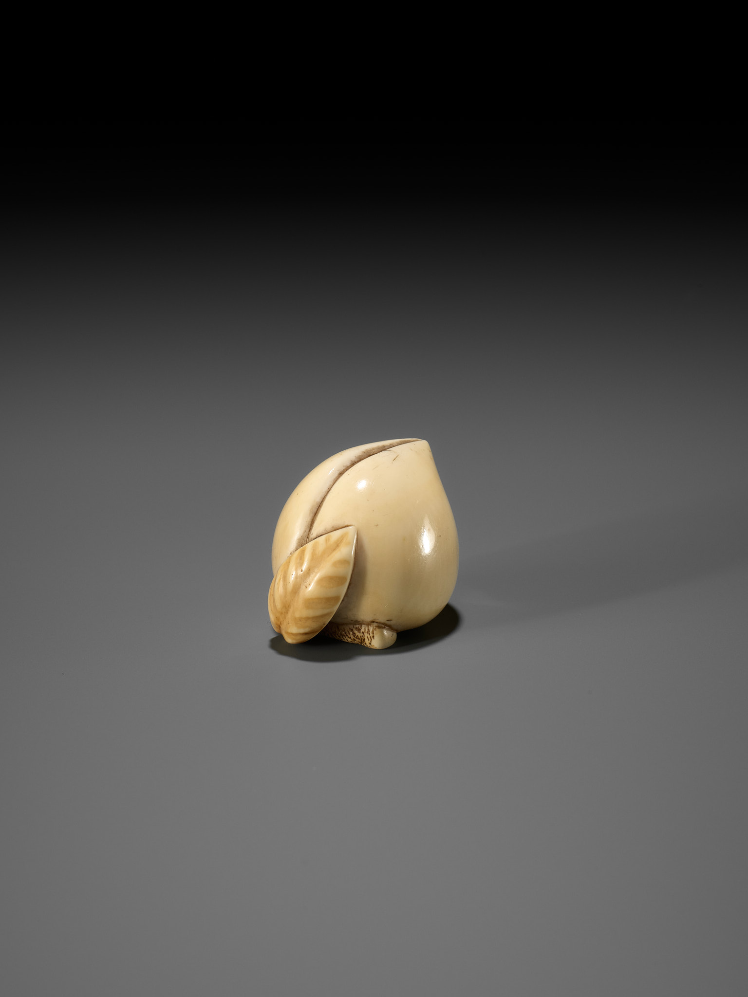 RANICHI: AN IVORY NETSUKE OF A PEACH - Image 10 of 12