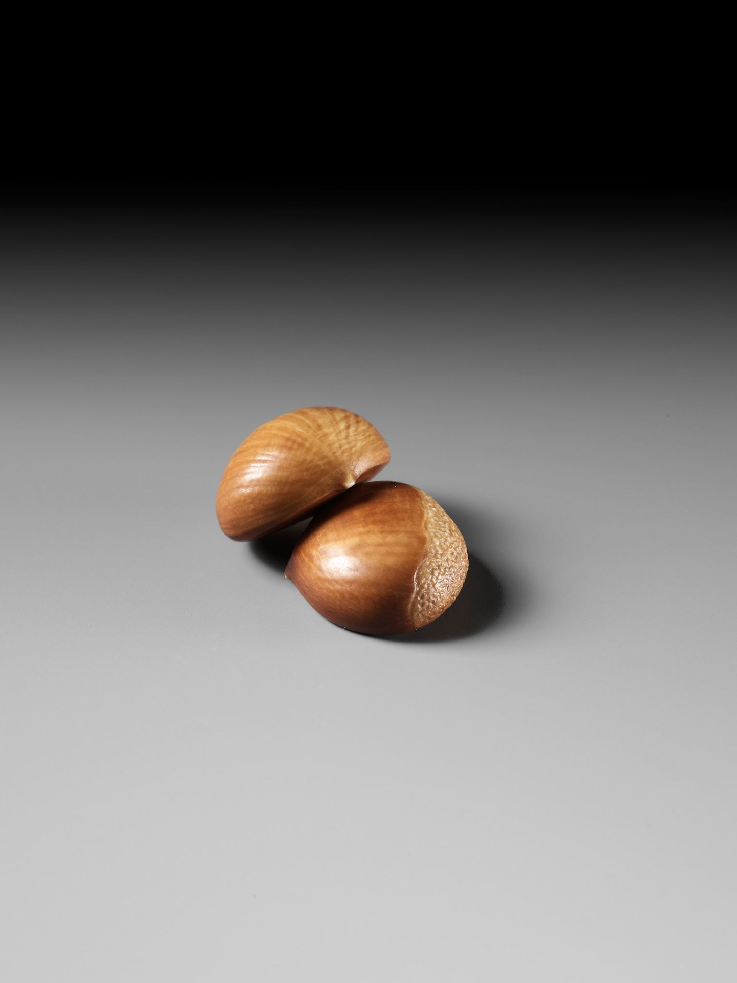 ANDO RYOKUZAN: A FINE LACQUERED IVORY NETSUKE OF TWO CHESTNUTS - Image 8 of 11