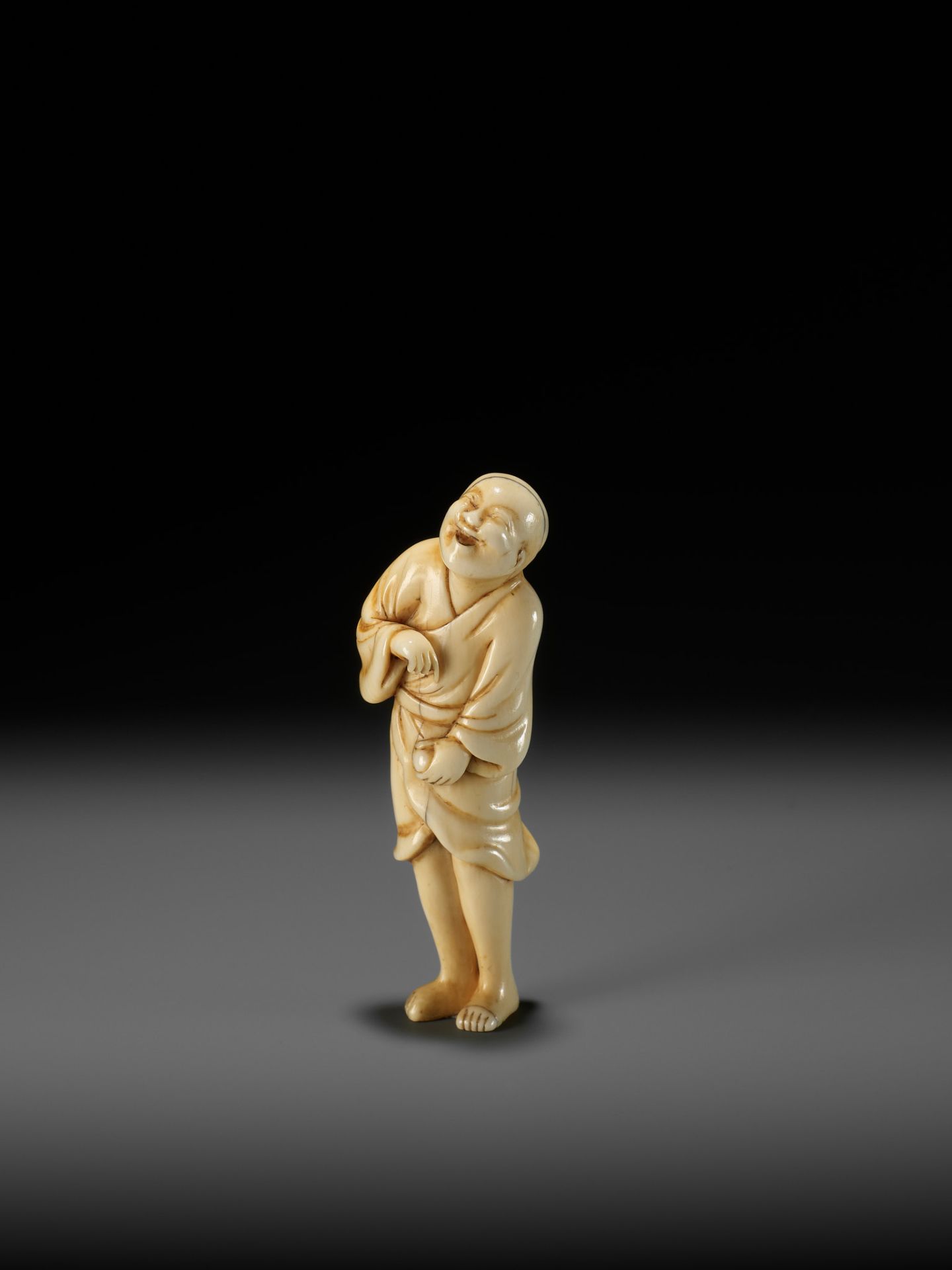 AN EARLY OSAKA SCHOOL IVORY NETSUKE OF A LAUGHING EGG-TESTER - Image 10 of 12