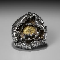 A VERY RARE SILVER NETSUKE OF A BLOOMING CHRYSANTHEMUM (KIKU)