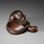 MASANAO: A FINE WOOD NETSUKE OF A RAT ON A MUSHROOM