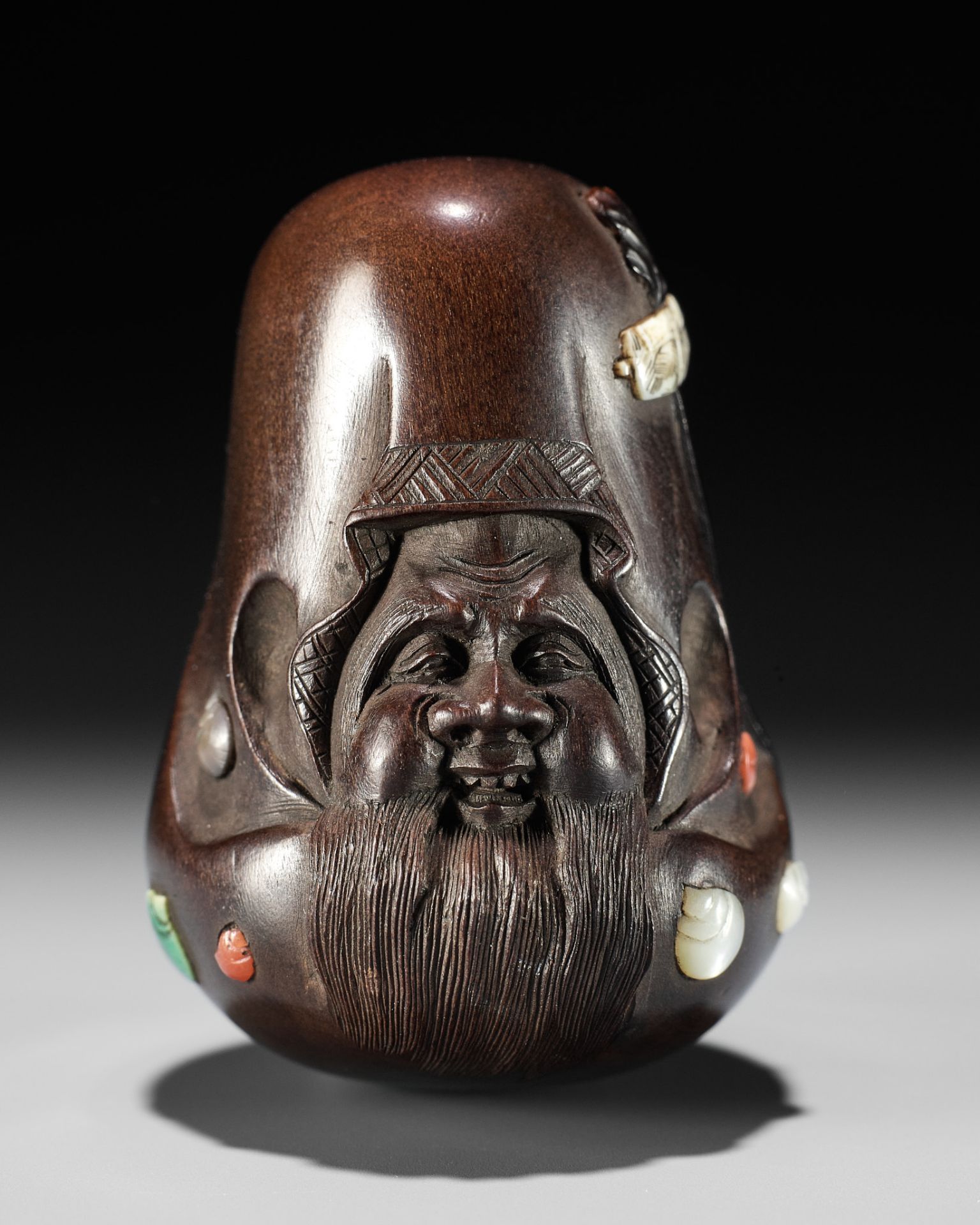 RYUGYOKU SANSUI: A VERY FINE INLAID WOOD NETSUKE OF FUKUROKUJU