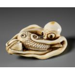 MASAKAZU: A LARGE AND IMPRESSIVE OSAKA SCHOOL IVORY NETSUKE OF AN OCTOPUS WITH CLAMS