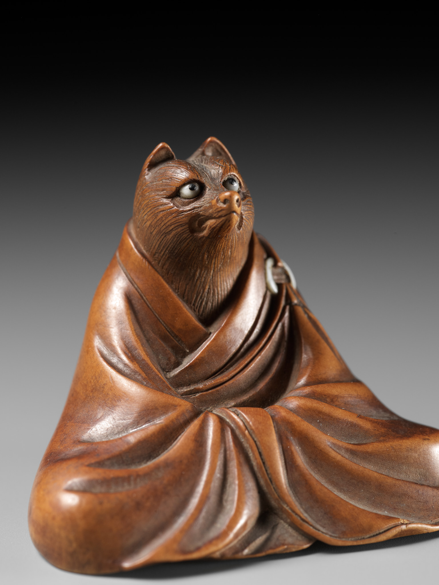 ANRAKU: A FINE AND HUMOROUS WOOD NETSUKE OF TANUKI DISGUISED AS A PRIEST - Image 3 of 14