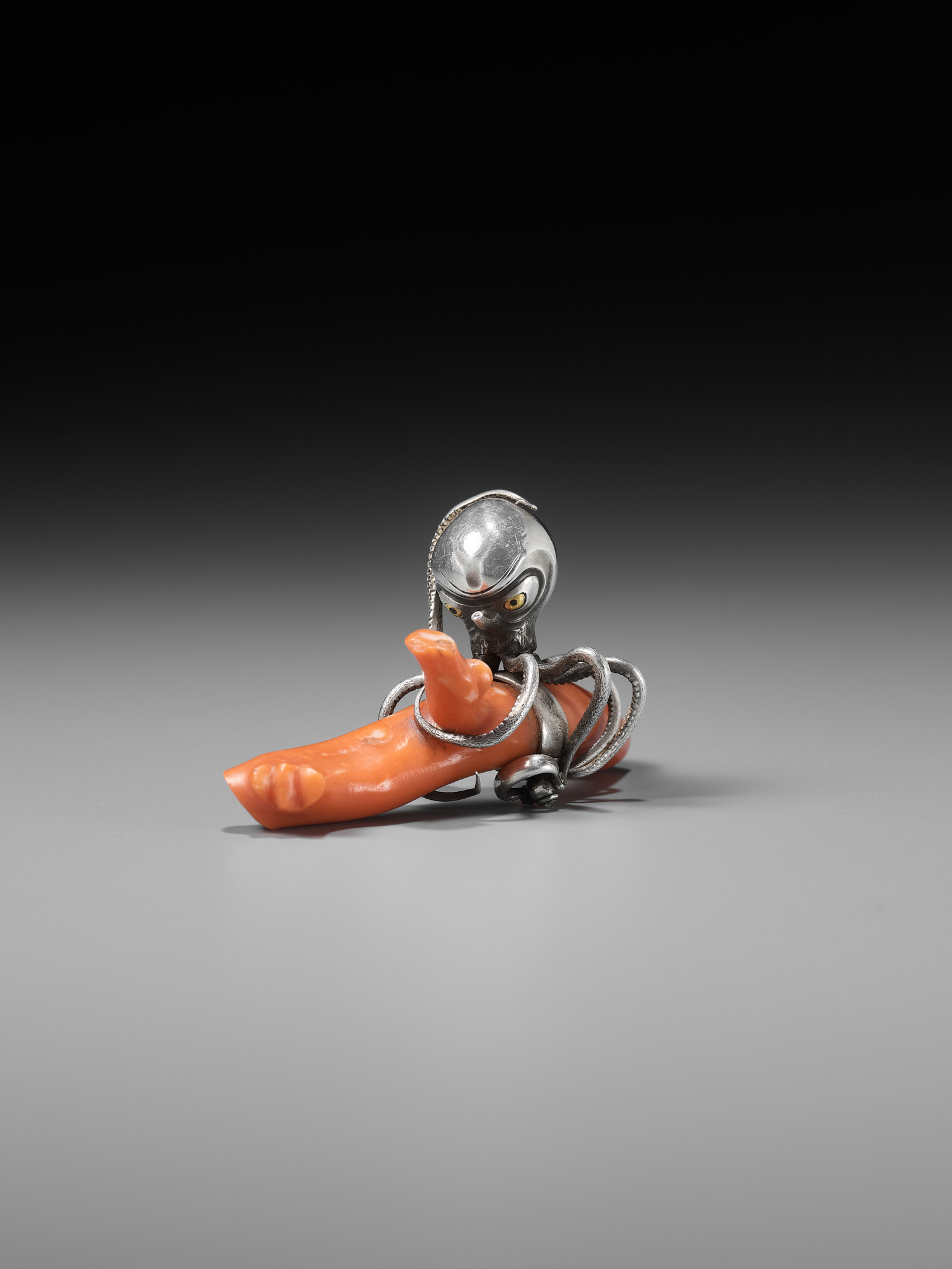 MINKOKU: A LARGE SILVER NETSUKE OF AN OCTOPUS GRASPING A PIECE OF CORAL - Image 2 of 14
