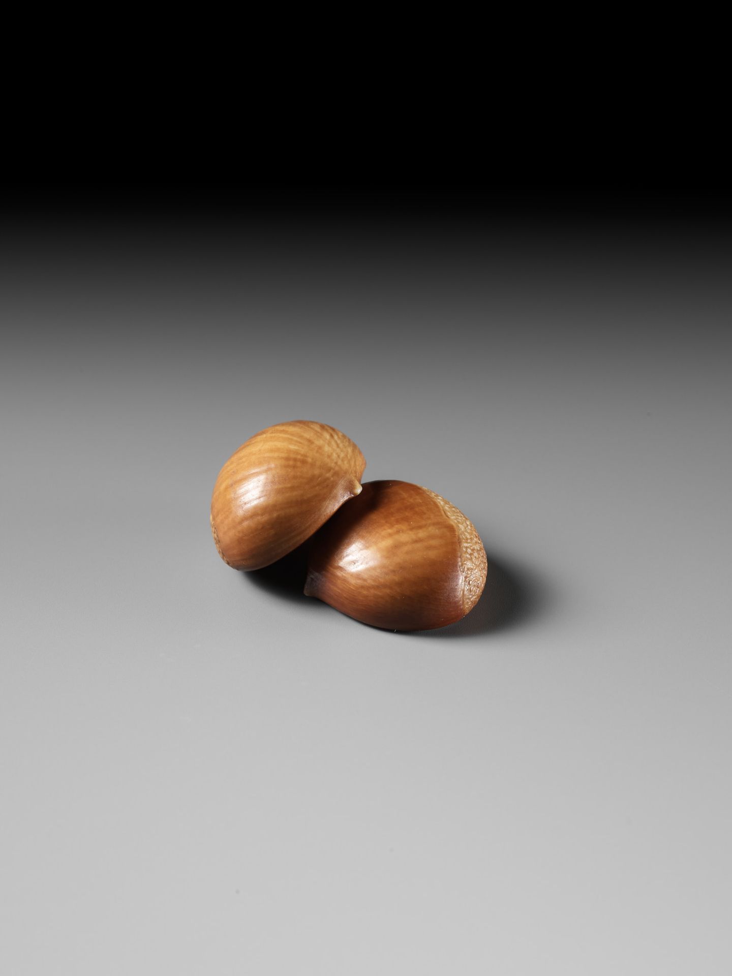 ANDO RYOKUZAN: A FINE LACQUERED IVORY NETSUKE OF TWO CHESTNUTS - Image 3 of 11