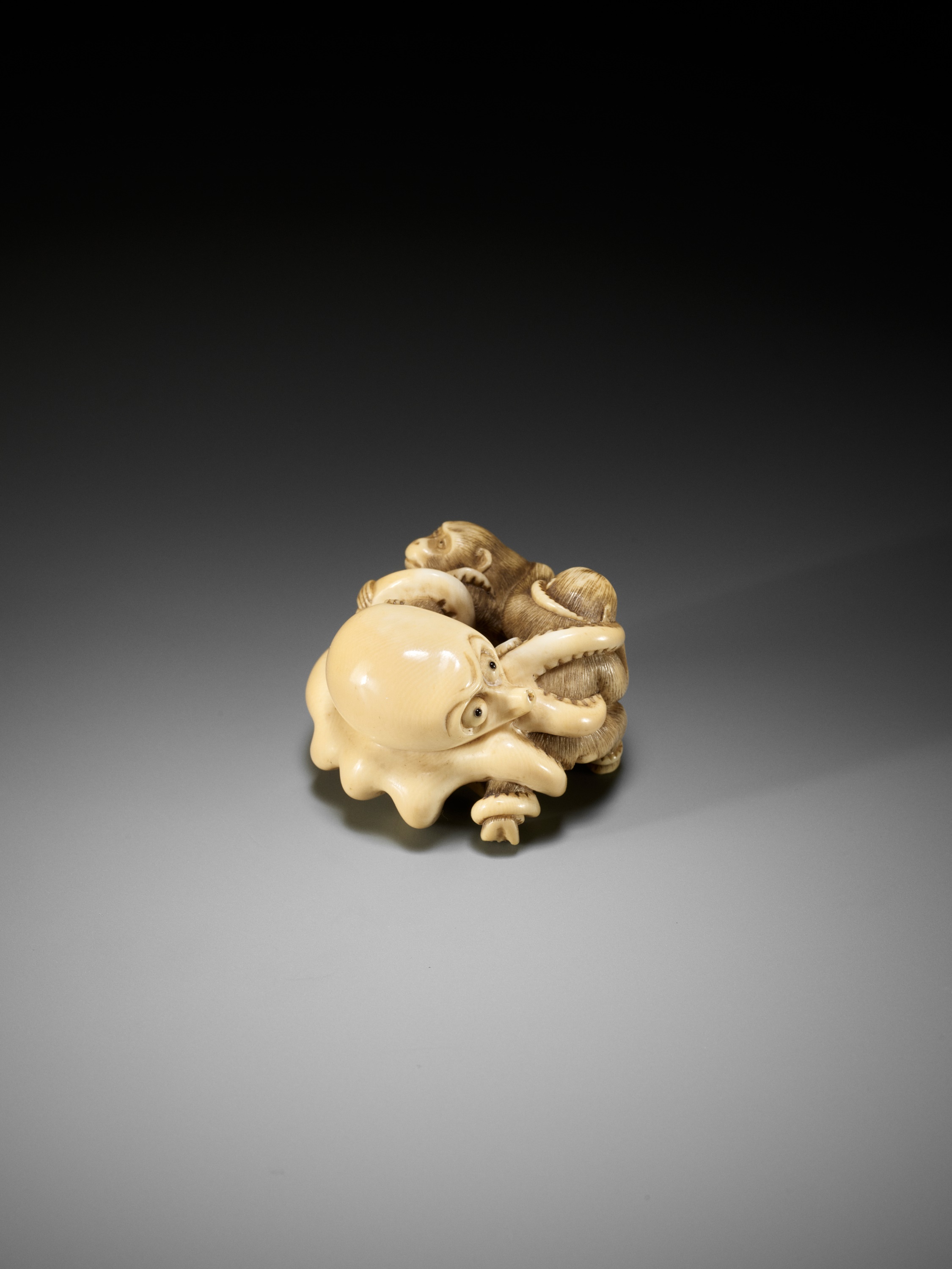 IKKOSAI: A SUPERB IVORY NETSUKE OF TWO MONKEYS FIGHTING AN OCTOPUS - Image 12 of 15