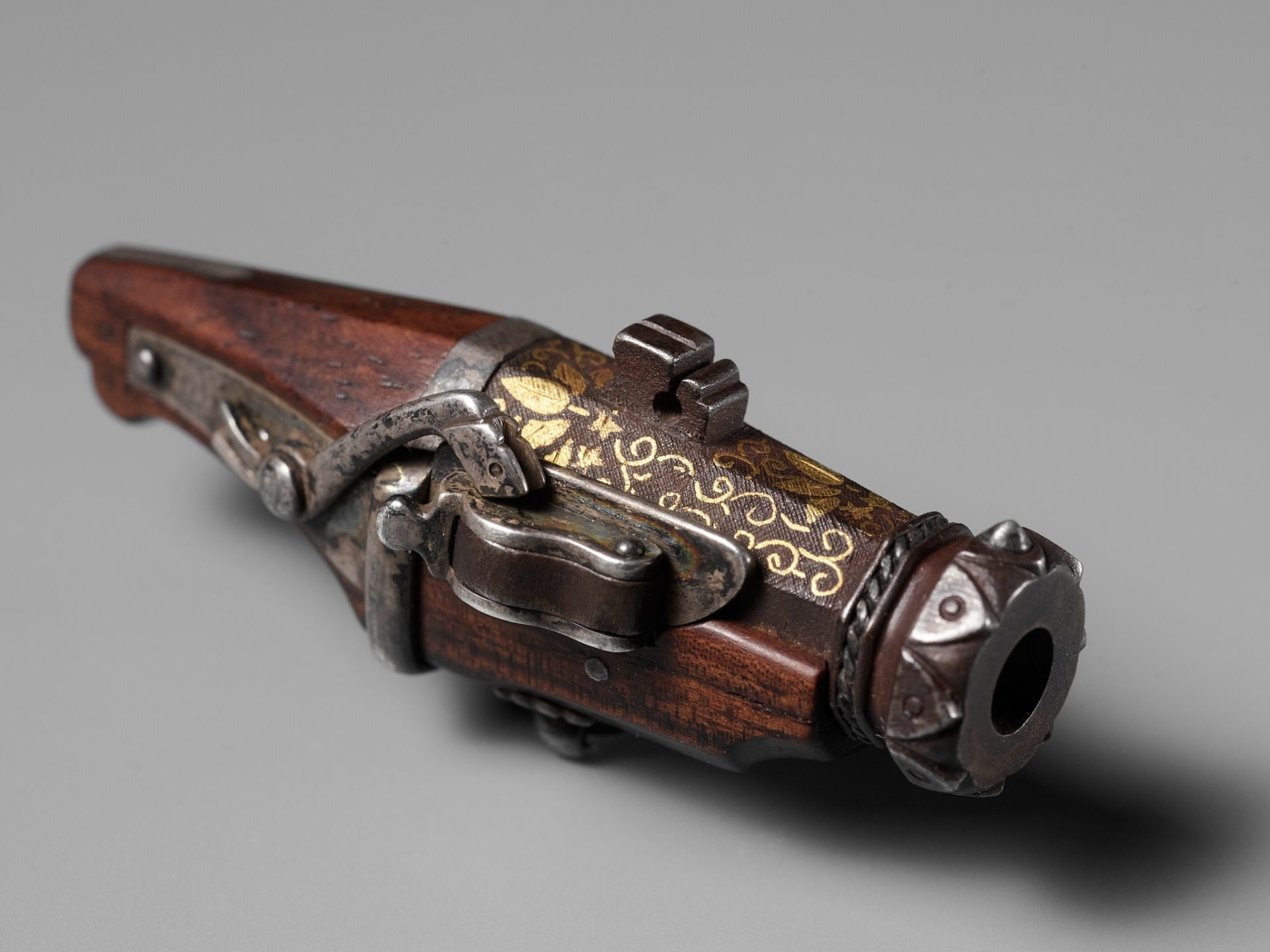 A RARE WOOD AND IRON NETSUKE OF A MINIATURE TANEGASHIMA TEPPO (RIFLE) - Image 2 of 9