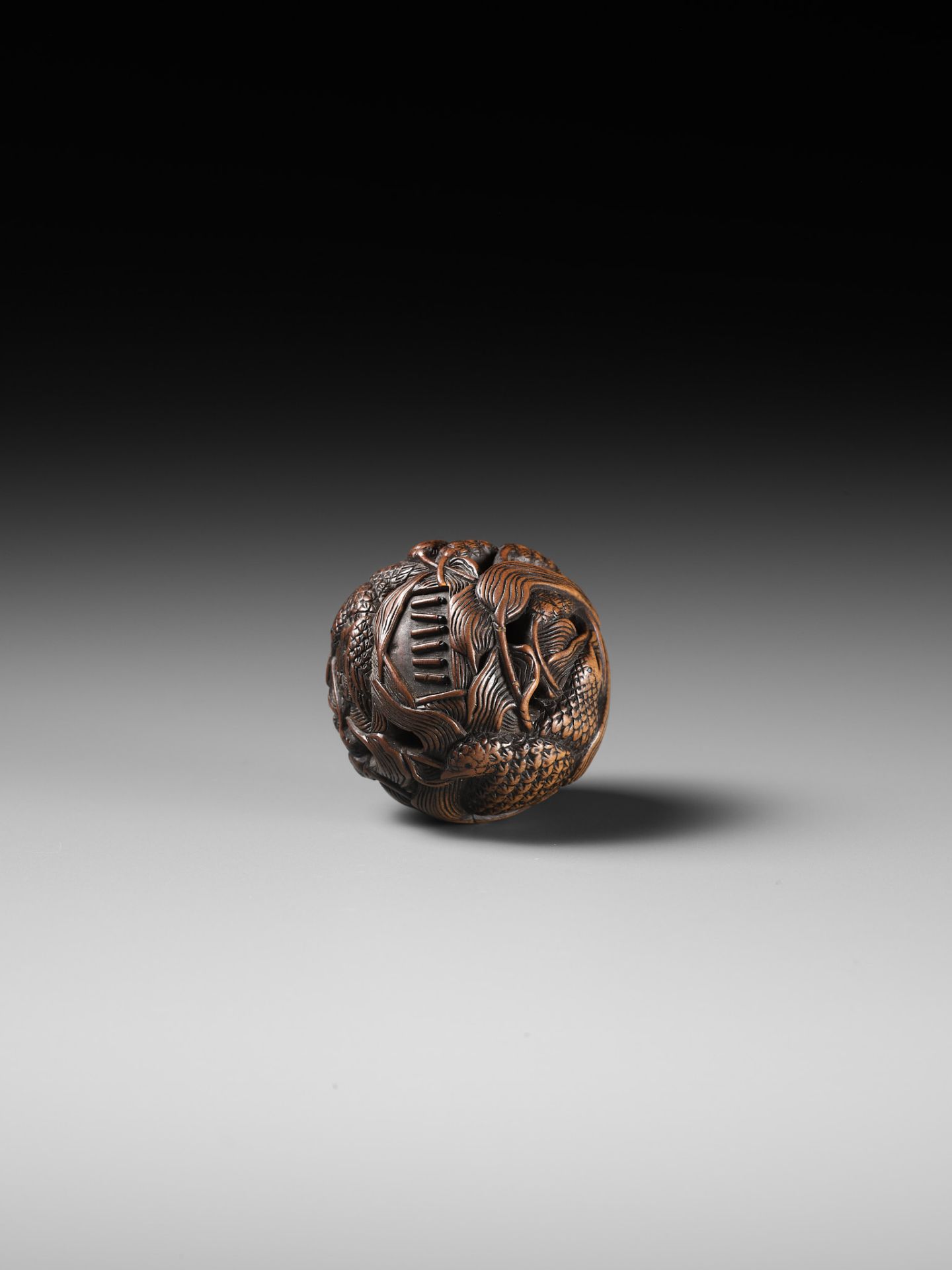 MASANAO: A FINE WOOD NETSUKE DEPICTING AN AUTUMNAL SCENE OF QUAILS AND MILLET - Image 12 of 14