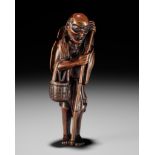 A LARGE AND RARE WOOD NETSUKE OF ONO NO KOMACHI