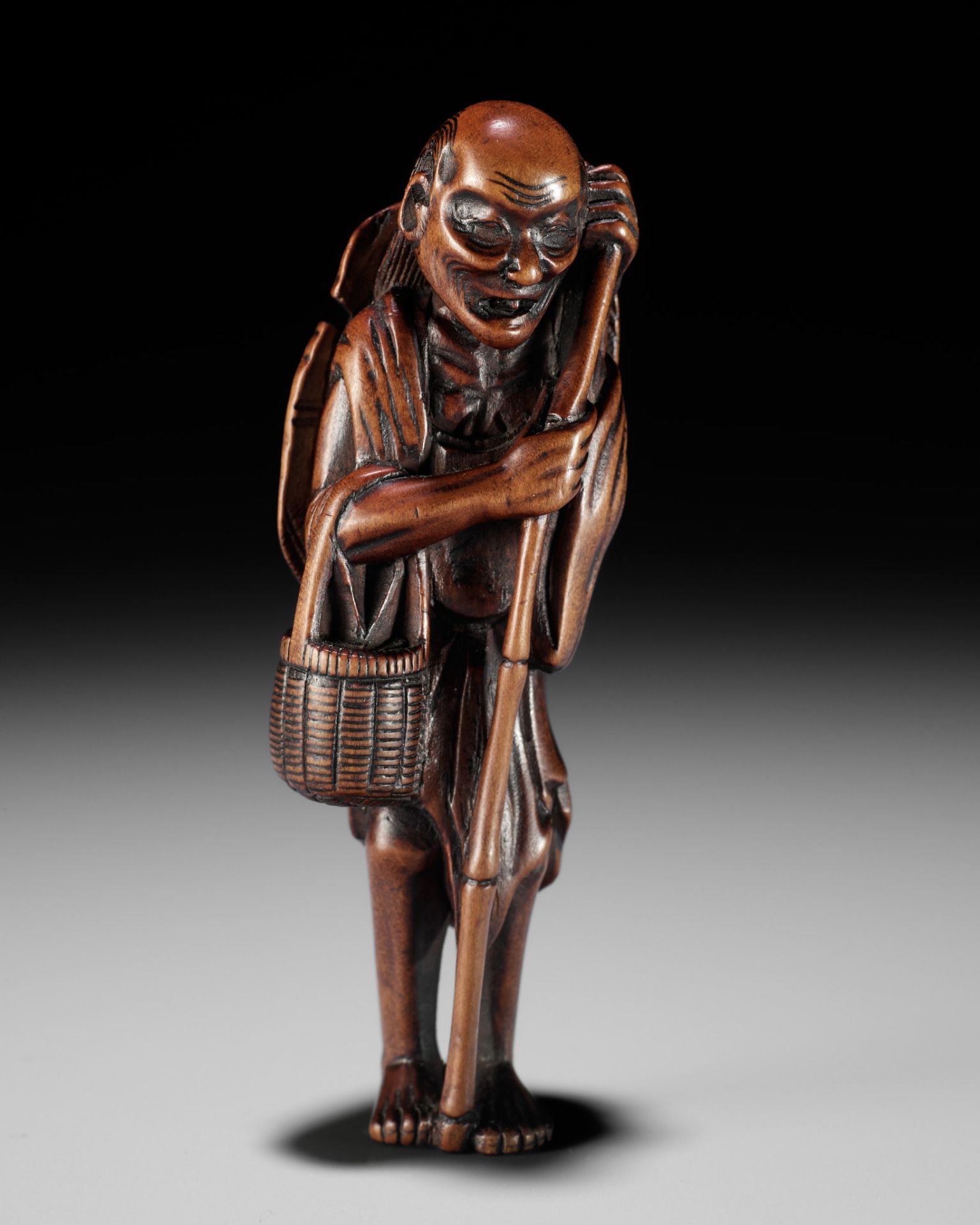 A LARGE AND RARE WOOD NETSUKE OF ONO NO KOMACHI