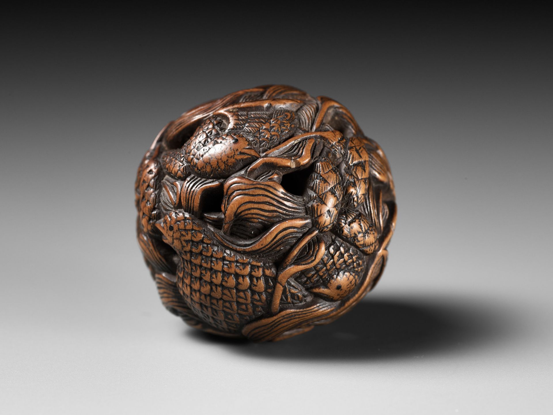 MASANAO: A FINE WOOD NETSUKE DEPICTING AN AUTUMNAL SCENE OF QUAILS AND MILLET - Image 7 of 14