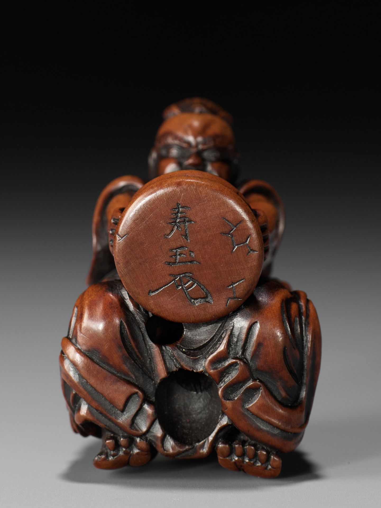 JUGYOKU: A POWERFUL WOOD NETSUKE OF A NIO CRUSHING MOCHI - Image 10 of 10