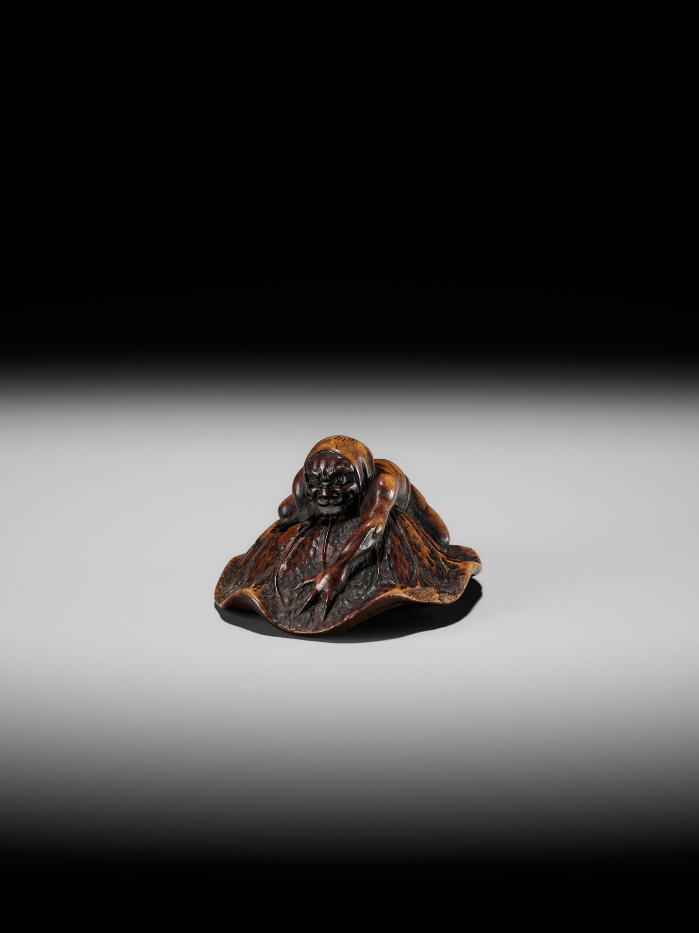 HOSHUNSAI MASAYUKI: A FINE WOOD NETSUKE OF AN ONI CATCHING A TERRAPIN - Image 6 of 13