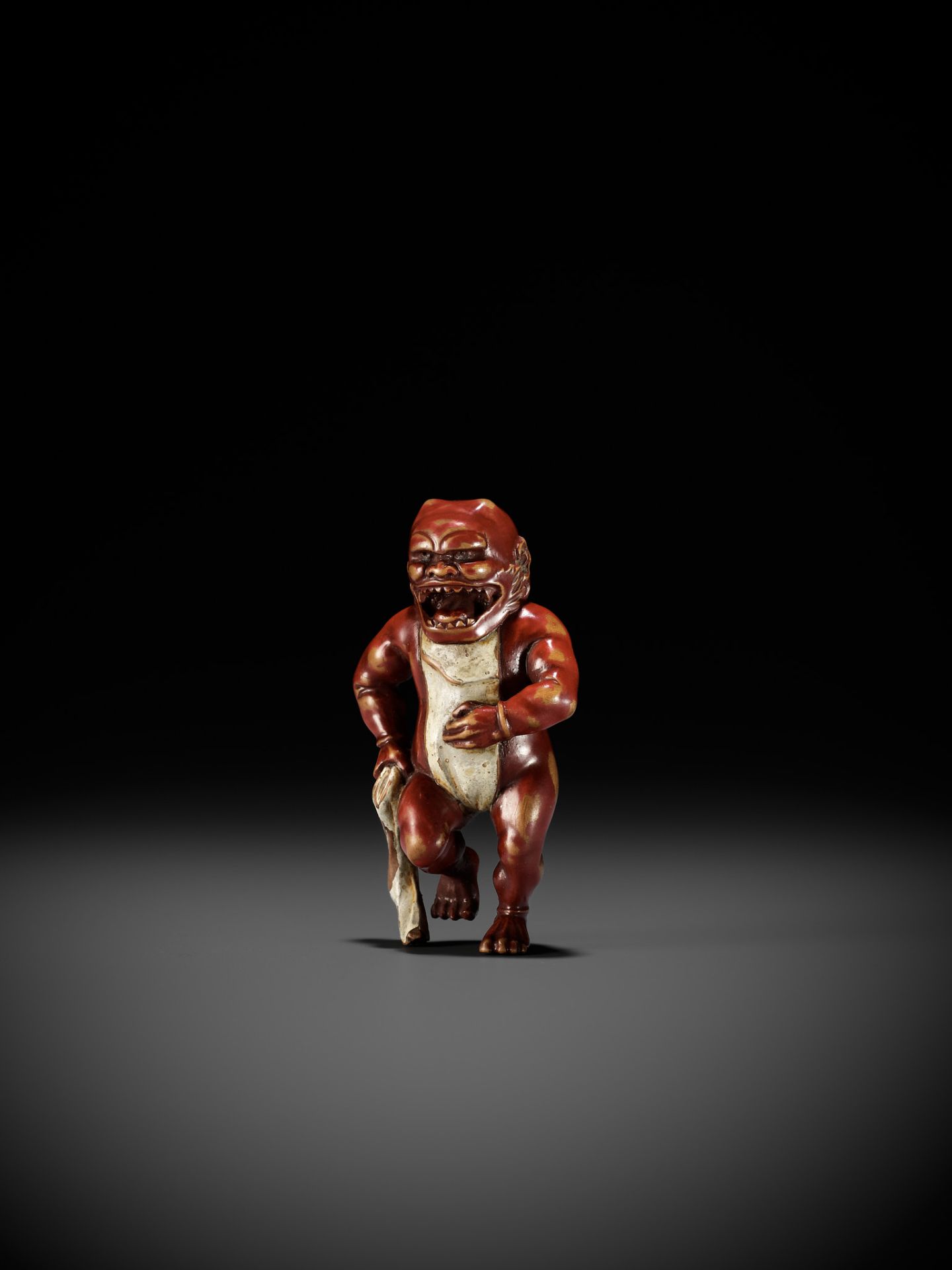 A RARE LACQUERED WOOD NETSUKE OF AN ONI TYING HIS FUNDOSHI - Image 8 of 12