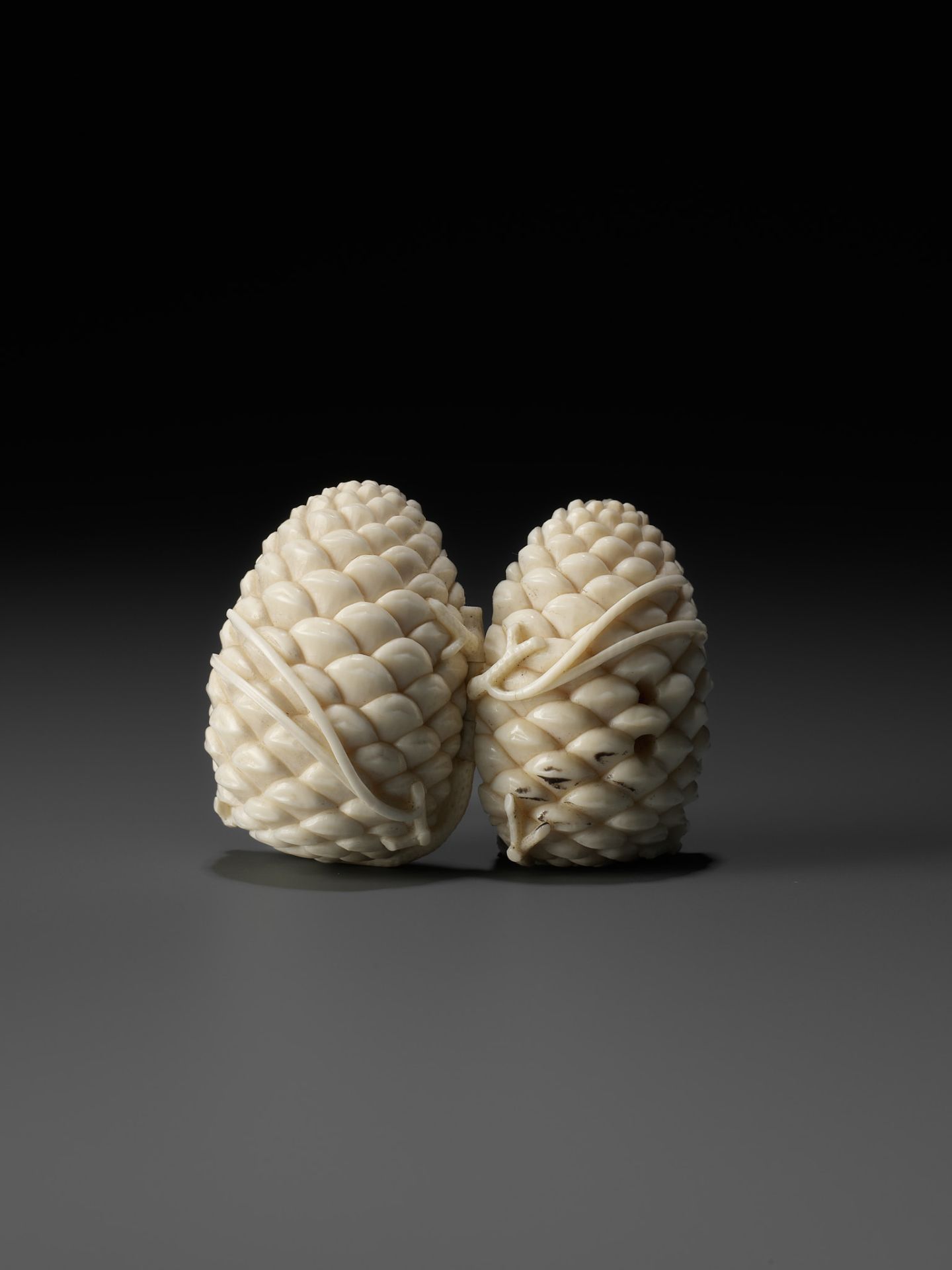 KAIGYOKU MASATSUGU: A FINE IVORY NETSUKE OF JO AND UBA INSIDE A PINECONE - Image 6 of 10