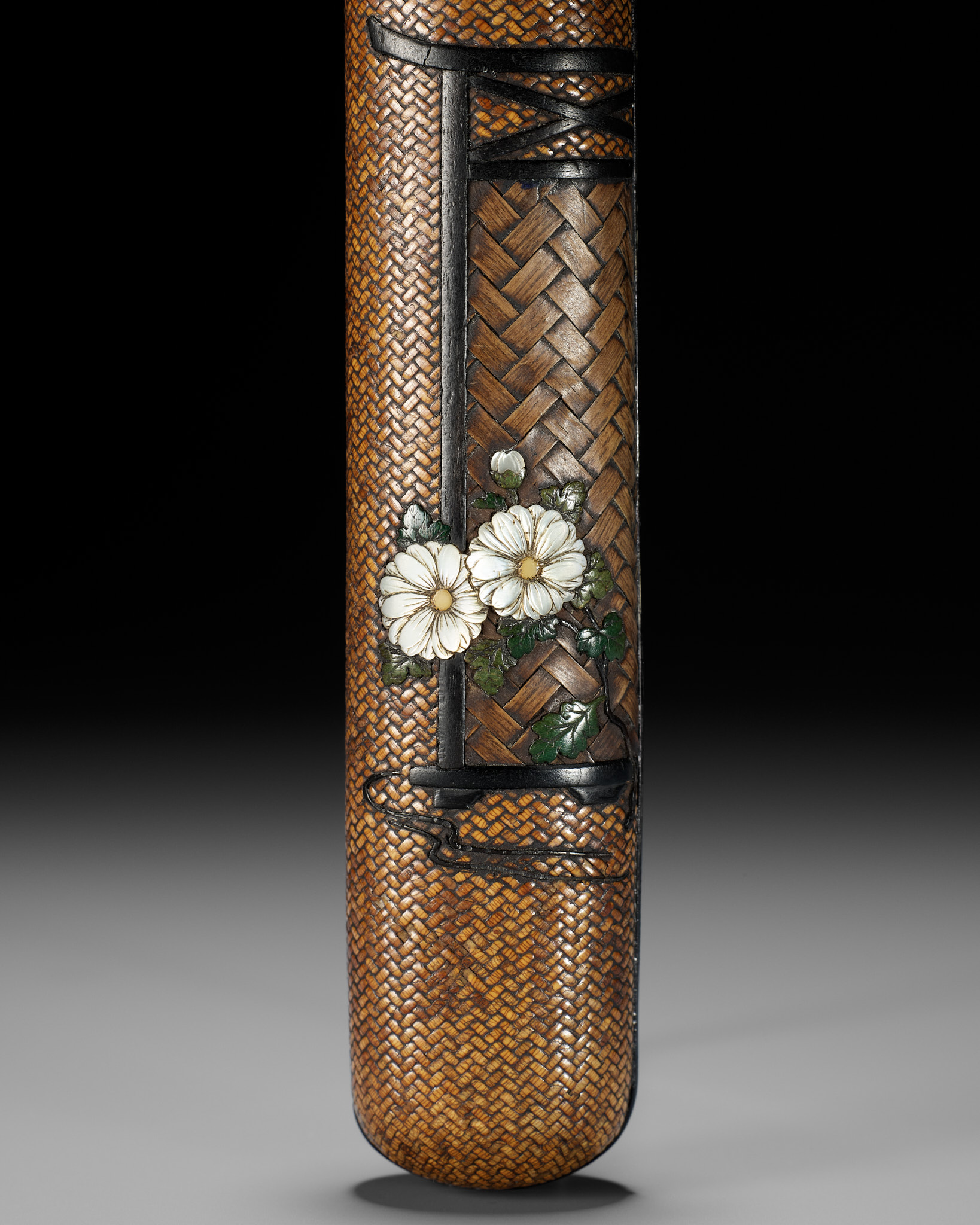 ISSHU: A FINE INLAID WOVEN RATTAN KISERUZUTSU WITH KIKU (CHRYSANTHEMUM) FLOWERS AND A TABLE SCREEN